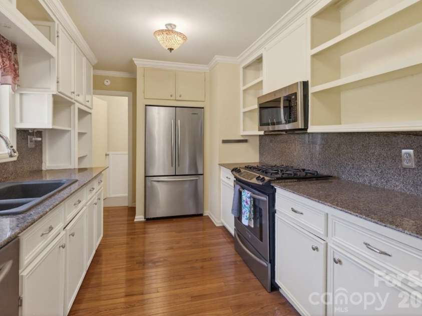 95 Whitney Avenue, Tryon, NC 28782.  MLS# CAR4354640, YatesRealty ID 14002. Perfect galley kitchen!