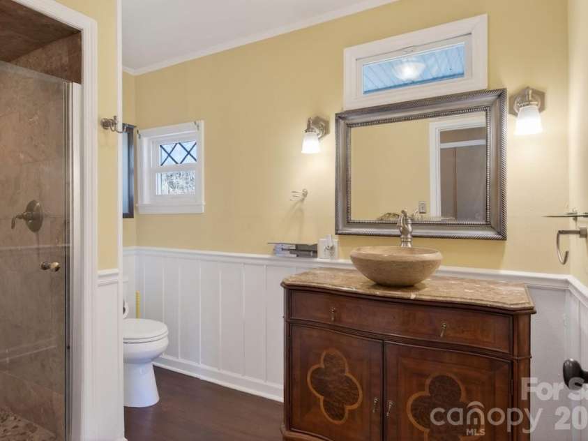 95 Whitney Avenue, Tryon, NC 28782.  MLS# CAR4354640, YatesRealty ID 14002. Primary bathroom