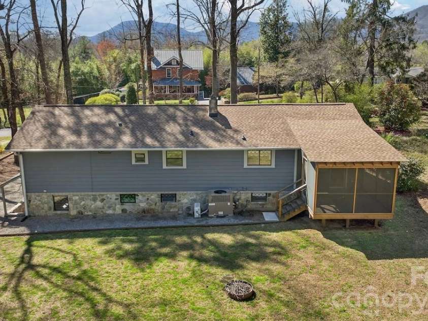 95 Whitney Avenue, Tryon, NC 28782.  MLS# CAR4354640, YatesRealty ID 14002. Rear elevation