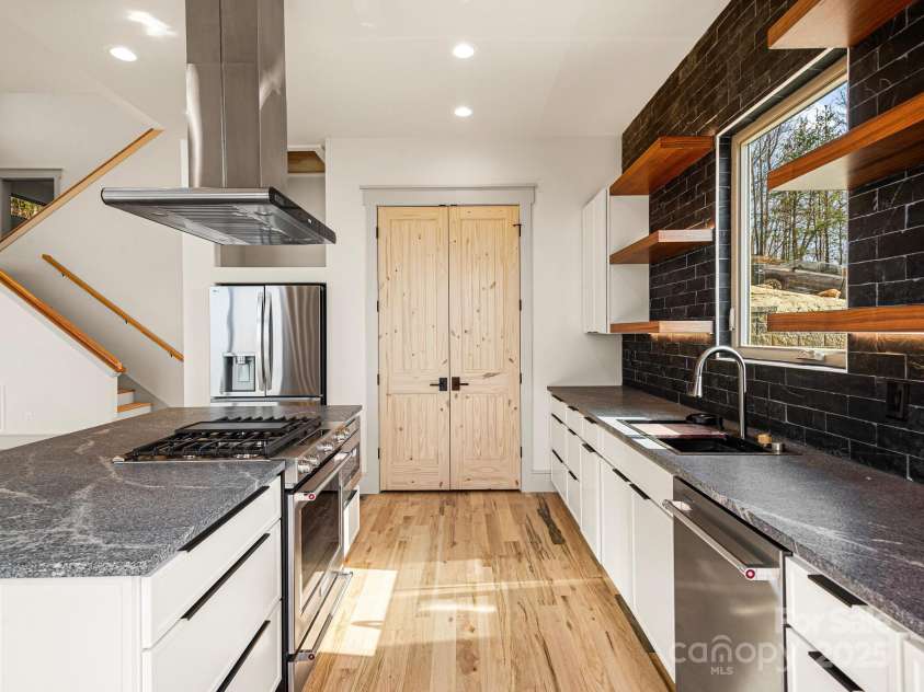 246 Half Moon Mile None, Lake Lure, NC 28746.  MLS# CAR4221091, YatesRealty ID 14004. Chef's kitchen with large pantry