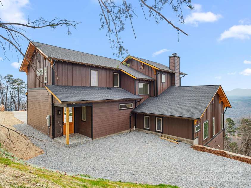 246 Half Moon Mile None, Lake Lure, NC 28746.  MLS# CAR4221091, YatesRealty ID 14004. Flat storage area behind home