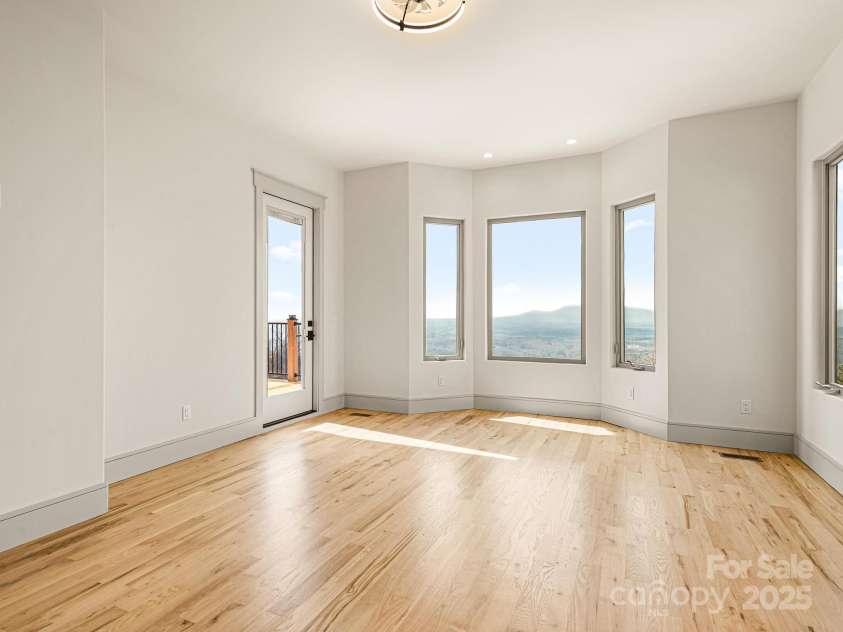 246 Half Moon Mile None, Lake Lure, NC 28746.  MLS# CAR4221091, YatesRealty ID 14004. Main level Primary Suite with plenty of room