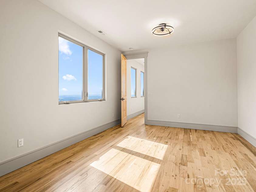 246 Half Moon Mile None, Lake Lure, NC 28746.  MLS# CAR4221091, YatesRealty ID 14004. Upper level bedroom