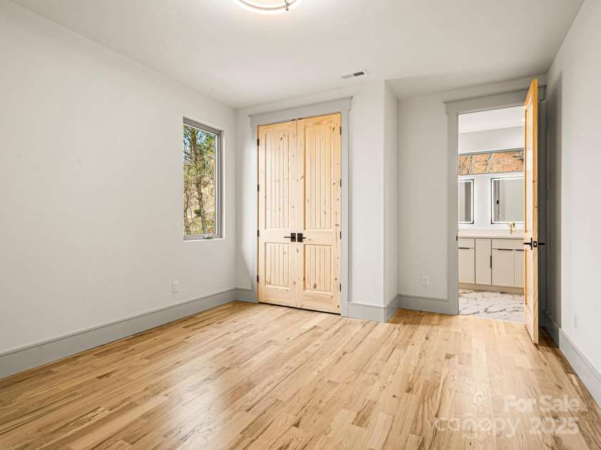 246 Half Moon Mile None, Lake Lure, NC 28746.  MLS# CAR4221091, YatesRealty ID 14004. Upper level bedroom