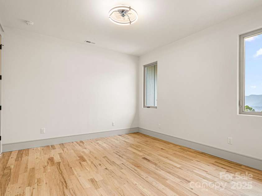 246 Half Moon Mile None, Lake Lure, NC 28746.  MLS# CAR4221091, YatesRealty ID 14004. Upper level bedroom