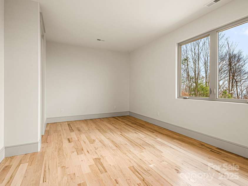 246 Half Moon Mile None, Lake Lure, NC 28746.  MLS# CAR4221091, YatesRealty ID 14004. Upper level bedroom