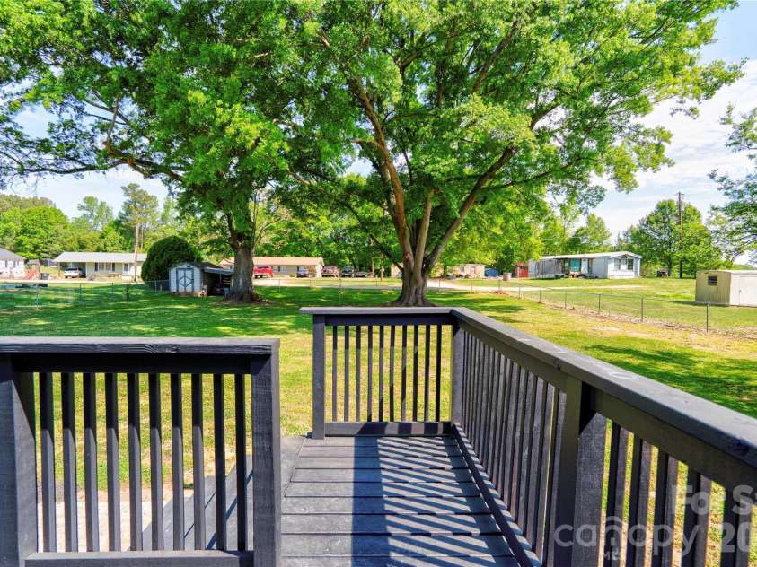 111 Dyer Drive, Shelby, NC 28152.  MLS# CAR4369783, YatesRealty ID 14007. Rear Deck/Back Yard