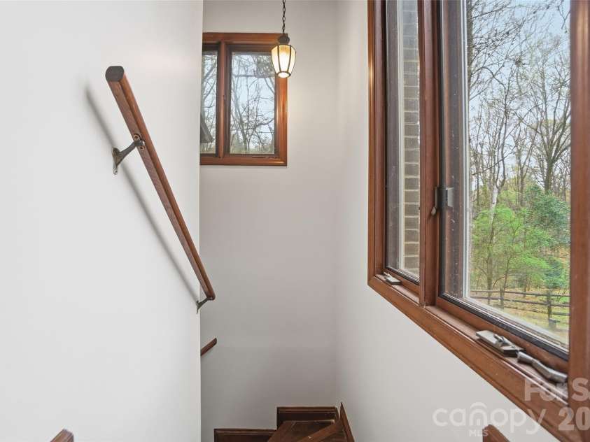 534 Aldeborough Lane, Charlotte, NC 28270.  MLS# CAR4356427, YatesRealty ID 14010. Stairwell to Garage