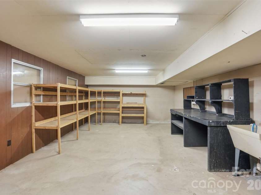 534 Aldeborough Lane, Charlotte, NC 28270.  MLS# CAR4356427, YatesRealty ID 14010. Storage / workshop in basement garage
