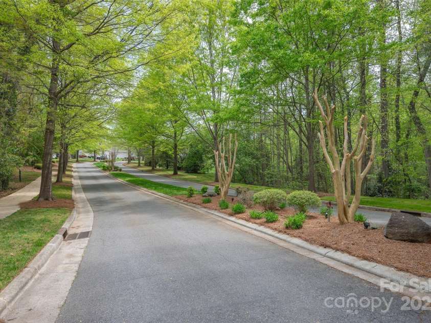 141 Ivy Creek Lane, Mooresville, NC 28115.  MLS# CAR4246190, YatesRealty ID 14012. Beautiful entrance into The Village on Park