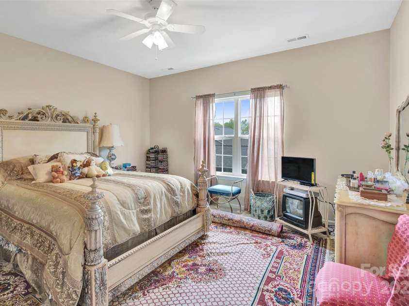 141 Ivy Creek Lane, Mooresville, NC 28115.  MLS# CAR4246190, YatesRealty ID 14012. Bedroom #2 with closet and attic storage closet