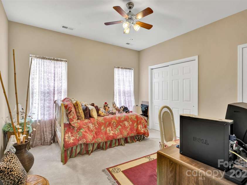 141 Ivy Creek Lane, Mooresville, NC 28115.  MLS# CAR4246190, YatesRealty ID 14012. Bedroom #3 on upper level with two closets for storage