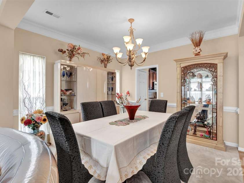 141 Ivy Creek Lane, Mooresville, NC 28115.  MLS# CAR4246190, YatesRealty ID 14012. Formal dining room just off the kitchen
