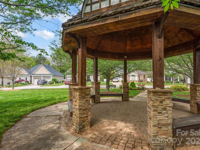 141 Ivy Creek Lane, Mooresville, NC 28115.  MLS# CAR4246190, YatesRealty ID 14012. Great shaded gazebo for visiting with friends