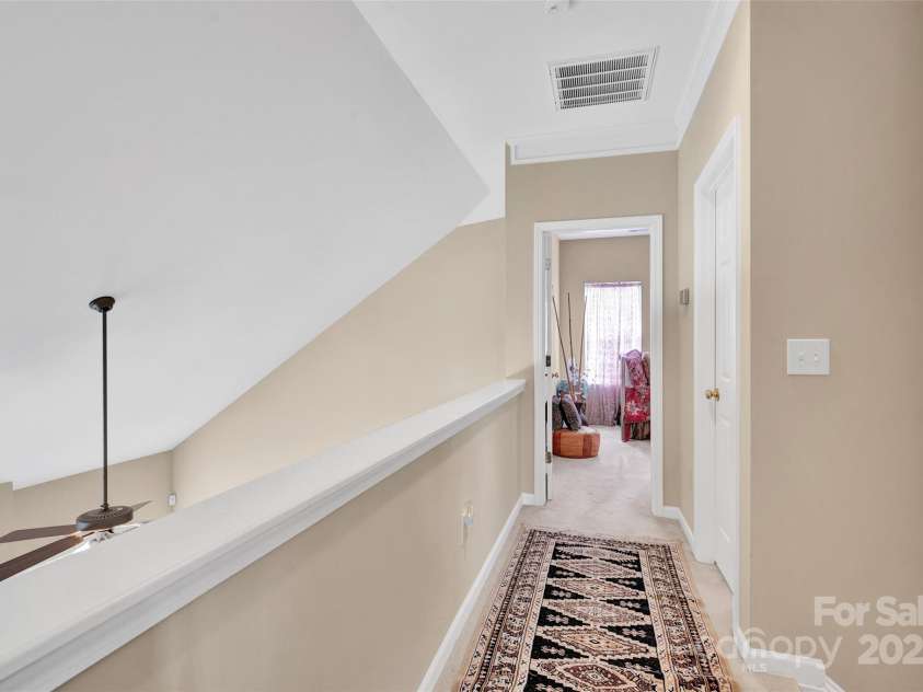 141 Ivy Creek Lane, Mooresville, NC 28115.  MLS# CAR4246190, YatesRealty ID 14012. Upper level with two additional bedrooms and guest bathroom