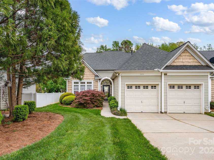 141 Ivy Creek Lane, Mooresville, NC 28115.  MLS# CAR4246190, YatesRealty ID 14012. Well maintained 3 BR home close to downtown Mooresville in The Village on Park.  Lawn Maintenance included in the HOA Fees!