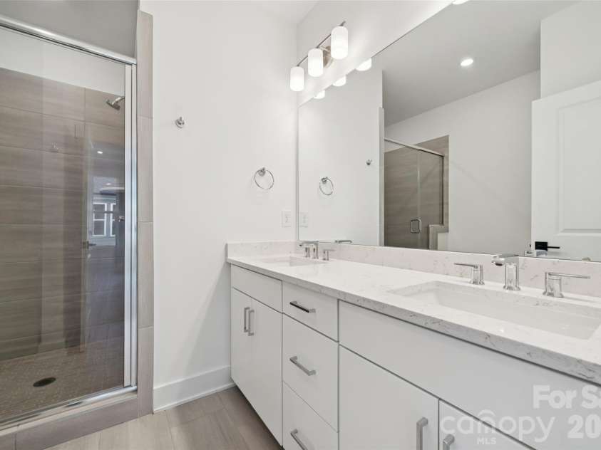 3656 Tryon Street, Charlotte, NC 28217.  MLS# CAR4362769, YatesRealty ID 14014. Dual Vanities in the Owners' Bath
