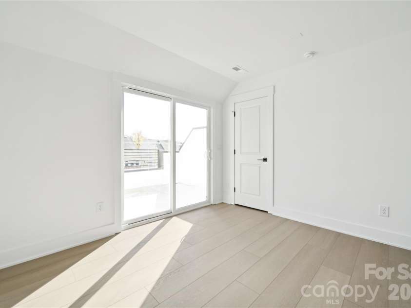 3656 Tryon Street, Charlotte, NC 28217.  MLS# CAR4362769, YatesRealty ID 14014. Fourth Floor Bedroom with Rooftop Terrace
