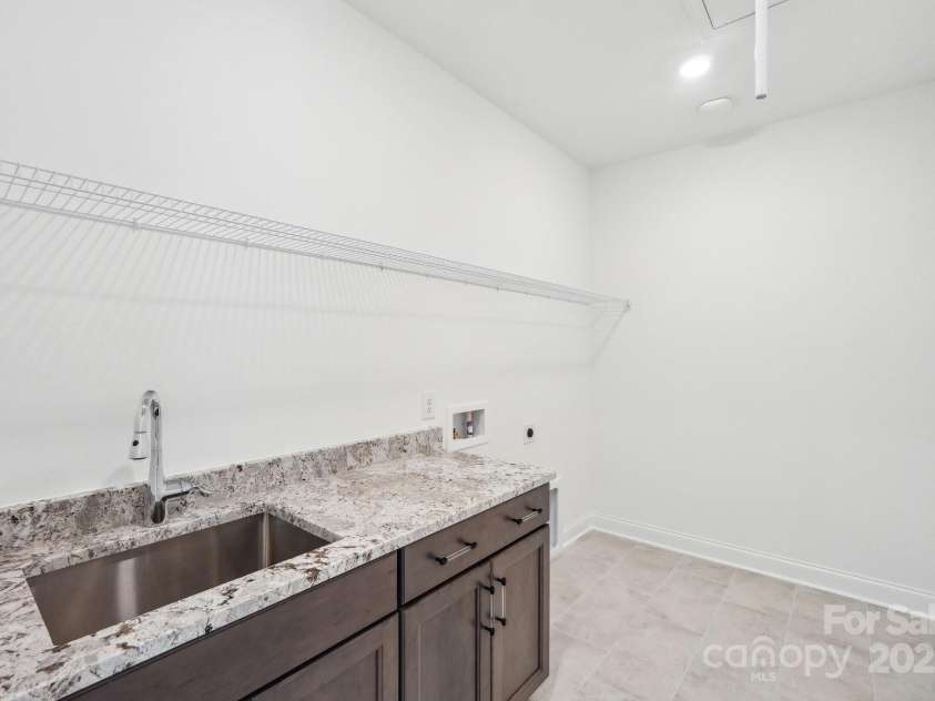 604 Hyder Trail, Tega Cay, SC 29708.  MLS# CAR4214719, YatesRealty ID 1402. Laundry room