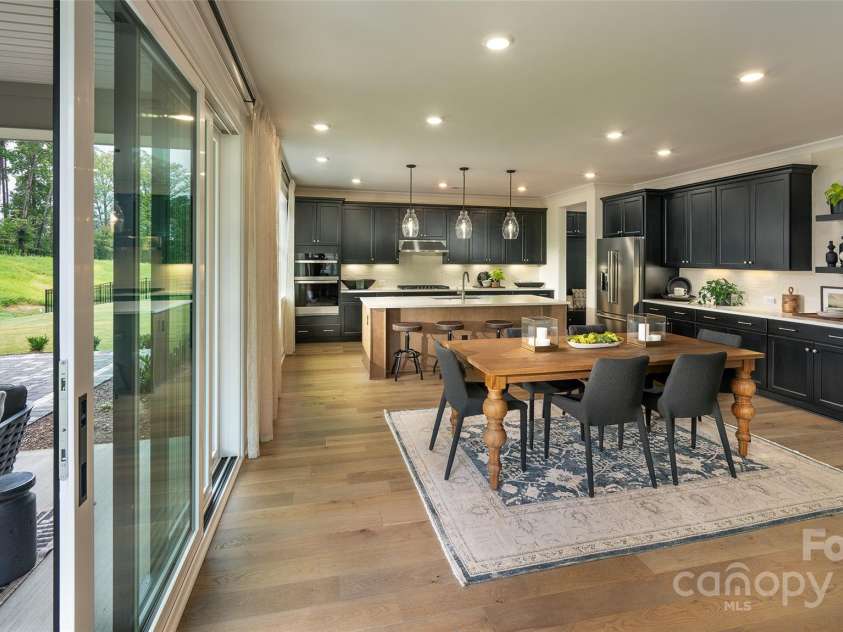 604 Hyder Trail, Tega Cay, SC 29708.  MLS# CAR4214719, YatesRealty ID 1402. Model Photo - sample only - dining/kitchen