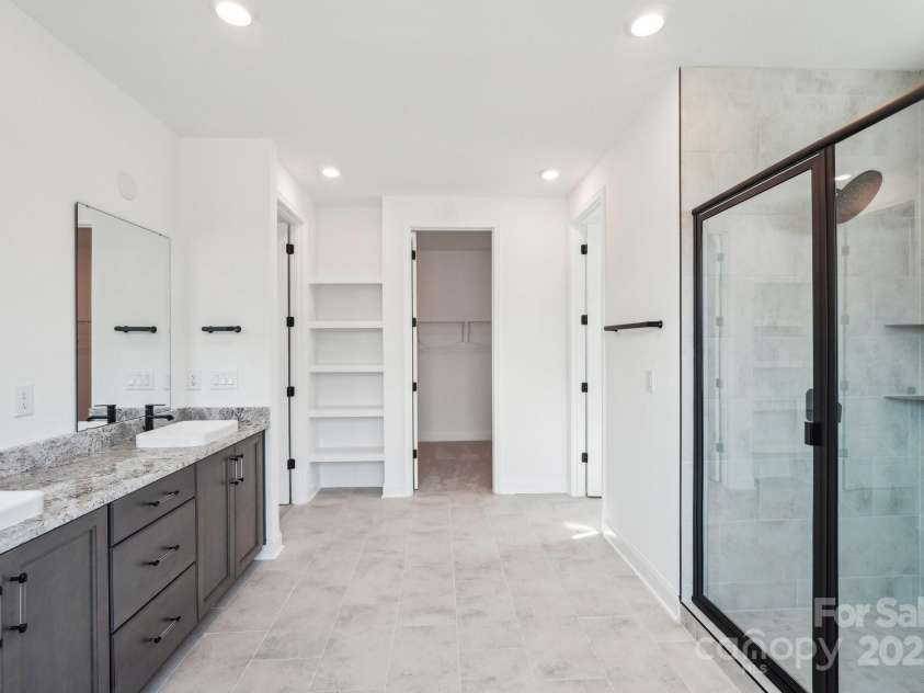 604 Hyder Trail, Tega Cay, SC 29708.  MLS# CAR4214719, YatesRealty ID 1402. Primary Bath