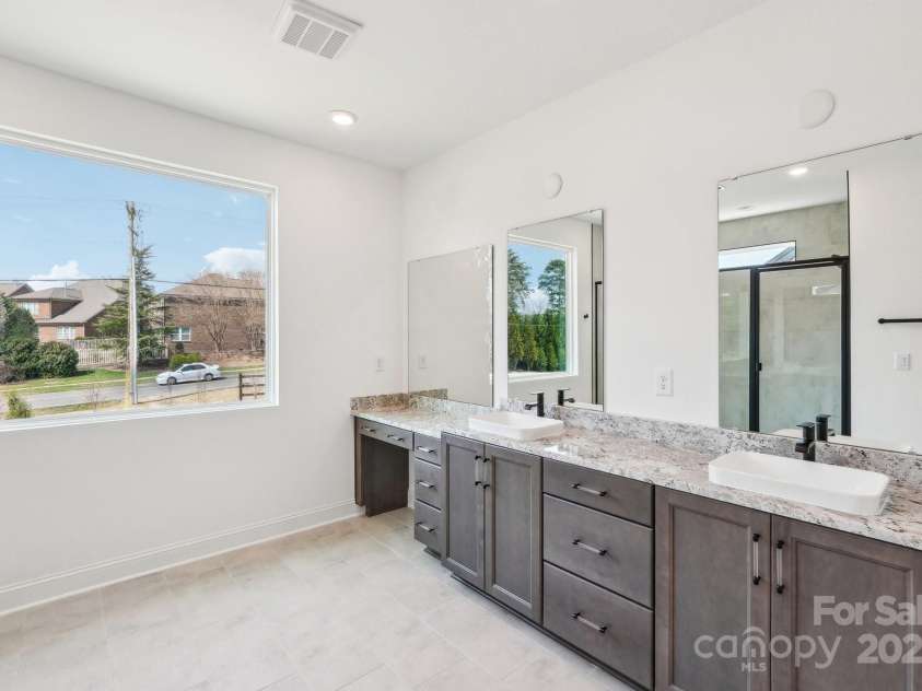 604 Hyder Trail, Tega Cay, SC 29708.  MLS# CAR4214719, YatesRealty ID 1402. Primary Bath