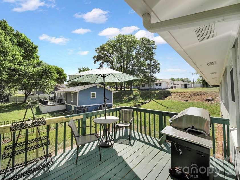 100 Privette Street, Fort Mill, SC 29715.  MLS# CAR4369827, YatesRealty ID 14023. Back Deck off Kitchen 