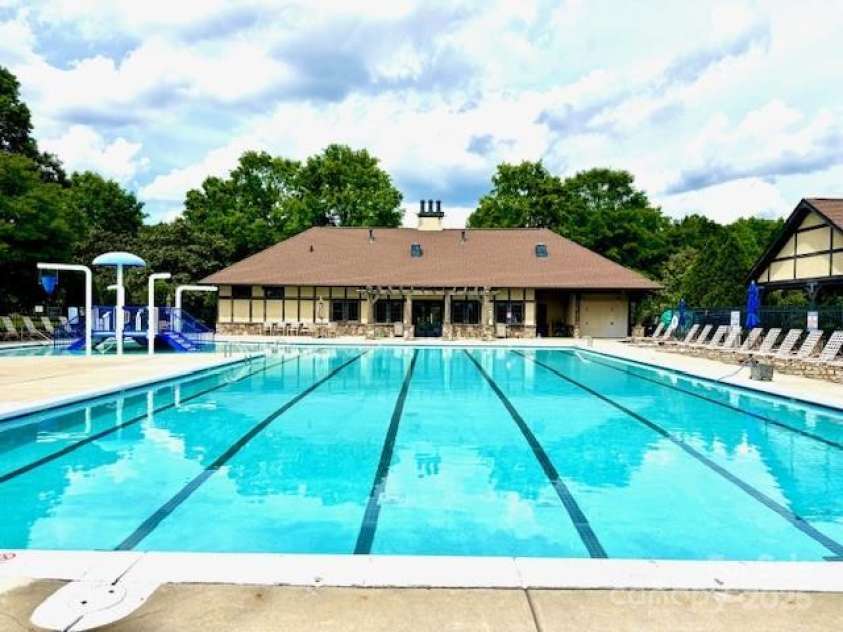 10008 King George Lane, Waxhaw, NC 28173.  MLS# CAR4257017, YatesRealty ID 14025. Take a splash into the stunning pool, swim laps, perfect for staying active, relaxing, socializing with friends, and enjoying a cool, refreshing retreat on sunny summer days!