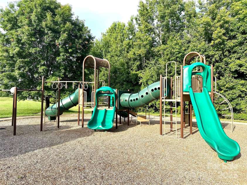 10008 King George Lane, Waxhaw, NC 28173.  MLS# CAR4257017, YatesRealty ID 14025. The kids' playground is a wonderful haven for endless fun, helping little ones burn off energy while providing hours of entertainment and laughter.