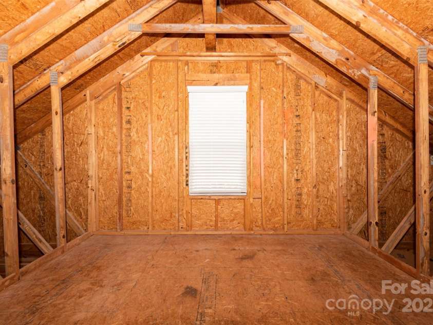 10008 King George Lane, Waxhaw, NC 28173.  MLS# CAR4257017, YatesRealty ID 14025. The walk-in storage room has so much space, there’s no need for a ladder—just tons of room to stash all those holiday decorations you lug in and out every year, plus the clothing you can’t let go of (yes, even that pai