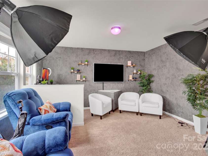 282 Fischer Road, Fort Mill, SC 29175.  MLS# CAR4254073, YatesRealty ID 14026. Kids Hangout currently used as studio