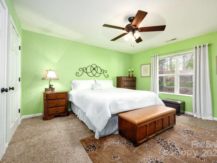 206 Carrington Place, Arden, NC 28704.  MLS# CAR4249528, YatesRealty ID 14027. Bright green walls, double windows
