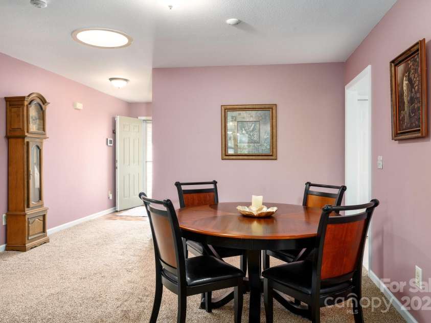 206 Carrington Place, Arden, NC 28704.  MLS# CAR4249528, YatesRealty ID 14027. Dining area facing entry door