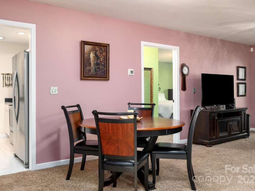 206 Carrington Place, Arden, NC 28704.  MLS# CAR4249528, YatesRealty ID 14027. Dining area with kitchen access