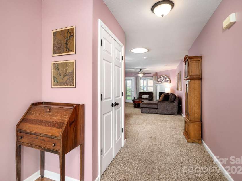 206 Carrington Place, Arden, NC 28704.  MLS# CAR4249528, YatesRealty ID 14027. Entry hall opens to living area