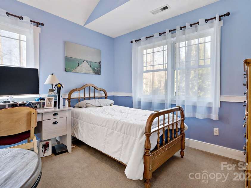 53 Sovereign Lane, Fairview, NC 28730.  MLS# CAR4213387, YatesRealty ID 14032. Bedroom upstairs