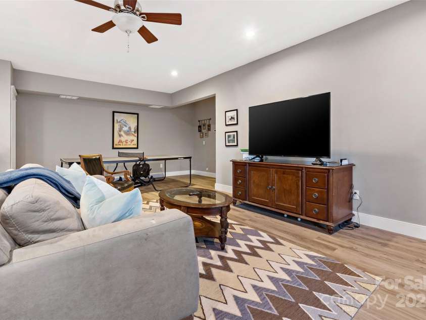 53 Sovereign Lane, Fairview, NC 28730.  MLS# CAR4213387, YatesRealty ID 14032. Family room