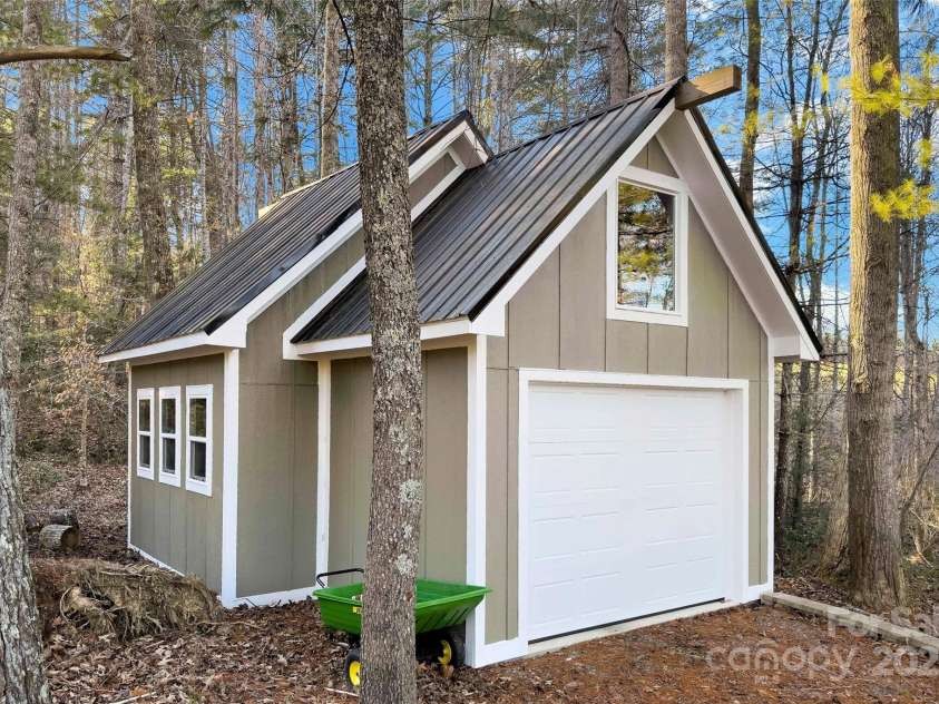 53 Sovereign Lane, Fairview, NC 28730.  MLS# CAR4213387, YatesRealty ID 14032. Garage/shed/workshop