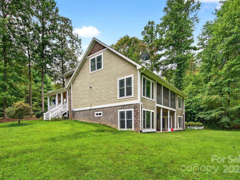 53 Sovereign Lane, Fairview, NC 28730.  MLS# CAR4213387, YatesRealty ID 14032. Gorgeous yard