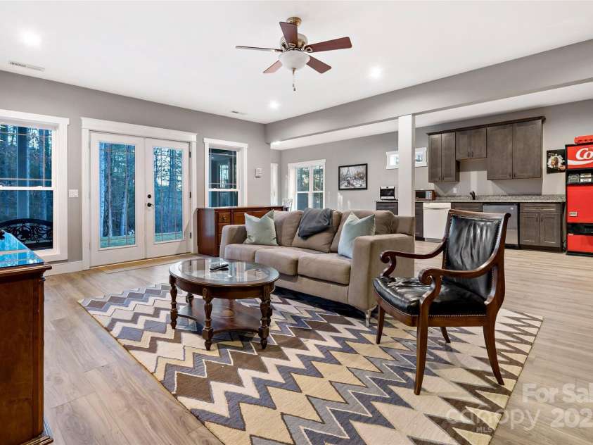 53 Sovereign Lane, Fairview, NC 28730.  MLS# CAR4213387, YatesRealty ID 14032. Large walkout/daylight basement