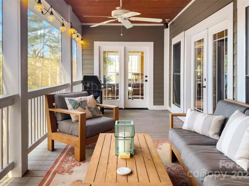 53 Sovereign Lane, Fairview, NC 28730.  MLS# CAR4213387, YatesRealty ID 14032. Screened in porch