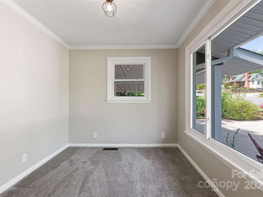 179 Grady Avenue, Tryon, NC 28782.  MLS# CAR4252526, YatesRealty ID 14035. 