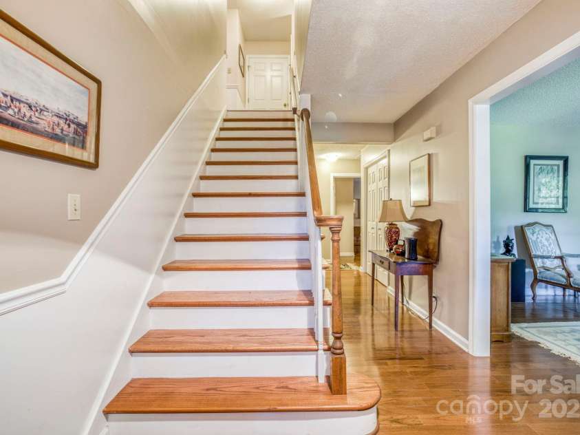 16 Cedar Drive, Mills River, NC 28759.  MLS# CAR4148510, YatesRealty ID 14036. Foyer & Staircase to Upper Level