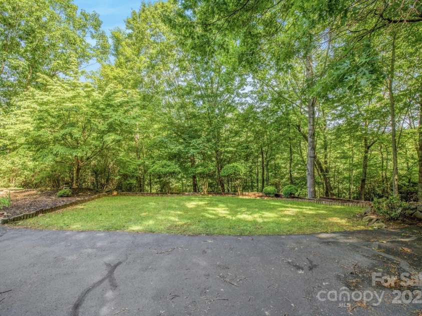 16 Cedar Drive, Mills River, NC 28759.  MLS# CAR4148510, YatesRealty ID 14036. Looking out from Garage
