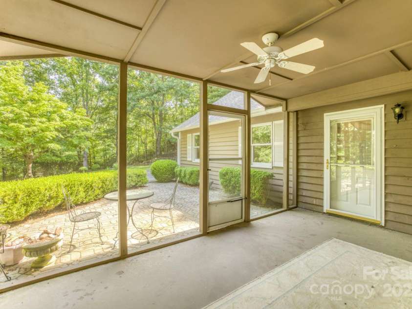 16 Cedar Drive, Mills River, NC 28759.  MLS# CAR4148510, YatesRealty ID 14036. Screened Porch Interior
