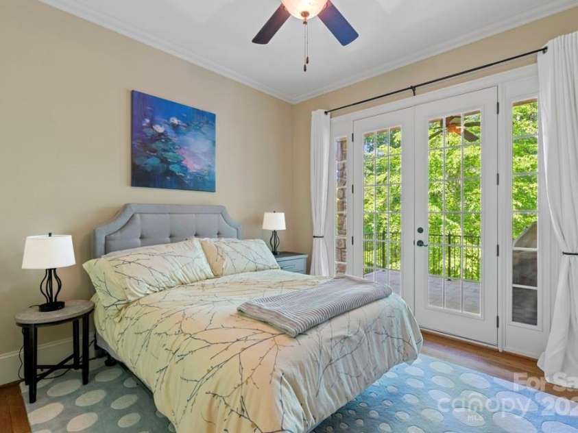 335 Whisper Lake Drive, New London, NC 28127.  MLS# CAR4260063, YatesRealty ID 14038. 2nd bedroom, door opens up to balcony