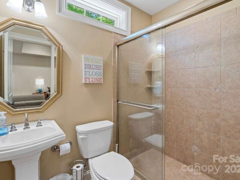 335 Whisper Lake Drive, New London, NC 28127.  MLS# CAR4260063, YatesRealty ID 14038. Full bath in basement