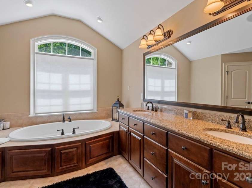 335 Whisper Lake Drive, New London, NC 28127.  MLS# CAR4260063, YatesRealty ID 14038. Primary bath