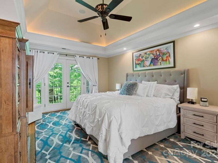 335 Whisper Lake Drive, New London, NC 28127.  MLS# CAR4260063, YatesRealty ID 14038. Primary bedroom, door opens up to private balcony