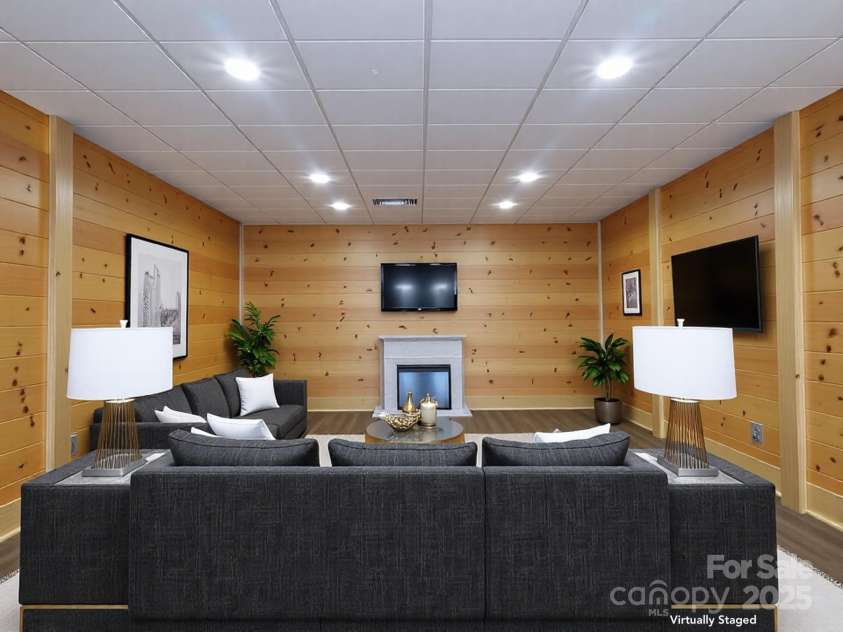 214 Whitney Boulevard, Lake Lure, NC 28746.  MLS# CAR4231828, YatesRealty ID 1404. Lower Level Flex Room